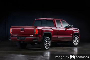 Insurance rates GMC Sierra in Seattle